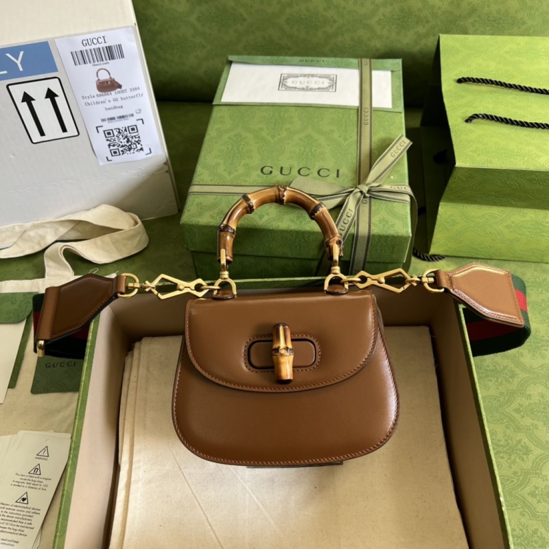G*u*i top handle bags